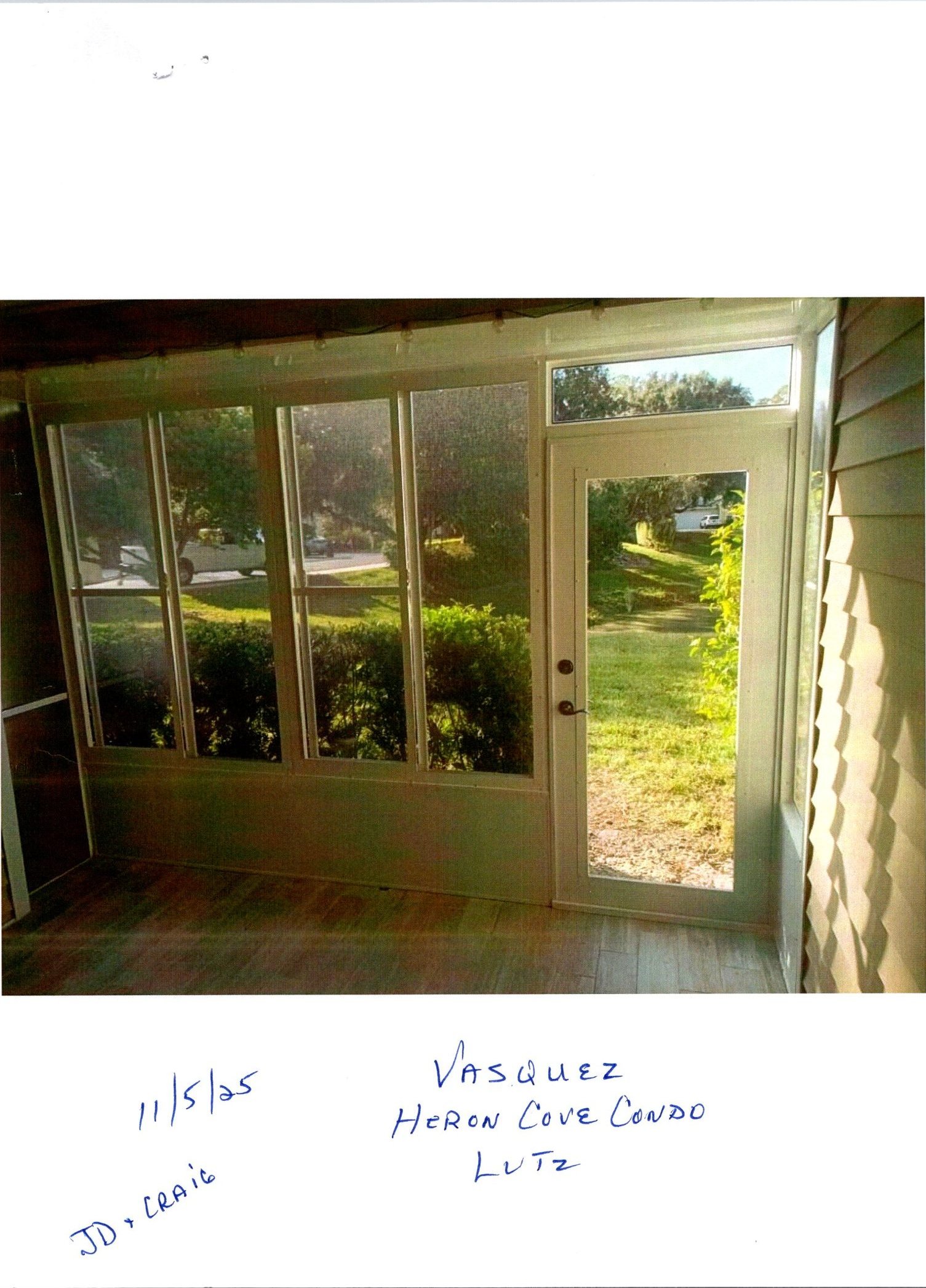Inside View Enclosed Lanai with Clear Soft Vinyls & Prime Door — completed project